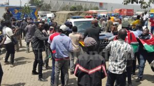 Crowd of youths and activists mixed up at the gate of Standard media group on 2nd October 2026.